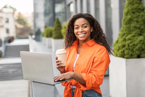 Happy Pretty Millennial African American Lady In Casual And Cup Of