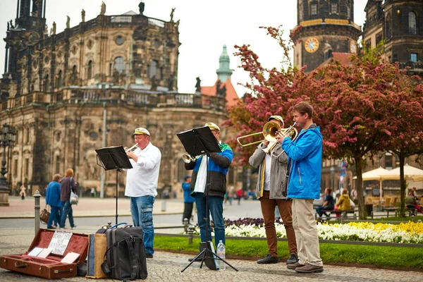 stock image A group of street musicians play trumpets in the town square. Dresden, Germany - 05.20.2019