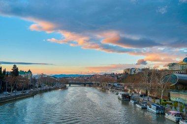 The waterfront of the city of Tbilisi along the river Kura. Tbilisi, Georgia - 03.20.2021