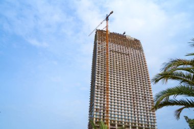 Construction of a multi-storey residential complex. The building is almost finished.