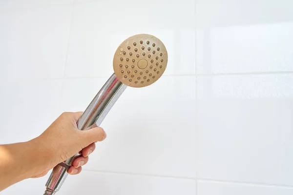 Woman Holding Hand Corroded Limescale Calcified Old Shower Head Hanging — Stock Photo, Image