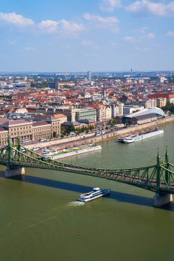 A street tap with clean water is built into the fence of the old town.