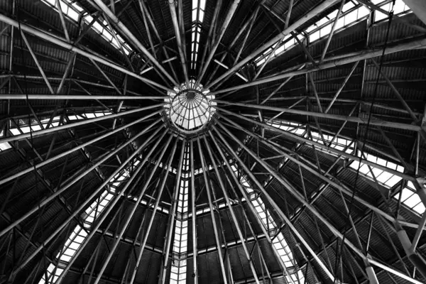 stock image A large metal dome from inside the shopping center building