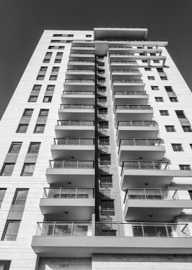 High-rise residential building ready for populating. Black and White clipart