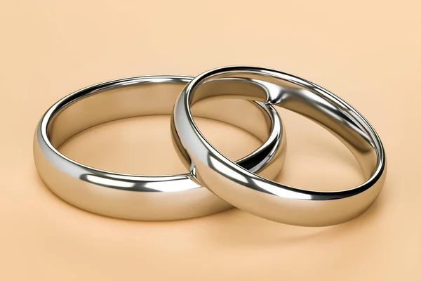 Illustration of two wedding silver rings. Unity and love concepts. 3d rendering