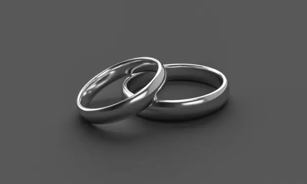 黑暗背景下的两个银婚戒指的图解 团结与爱的概念 — 图库照片#