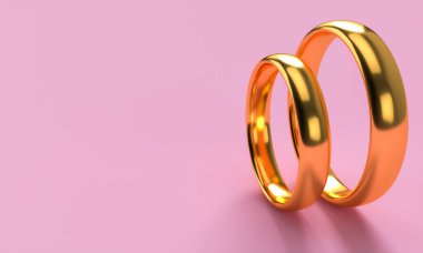 Sevgililer Günü 'nde boş arkaplanı olan iki altın alyansın resmi. Birlik ve sevgi kavramları