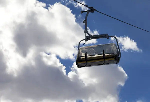 Chair Lift Sunlit Sky Clouds Evening Close View — Stock Photo, Image