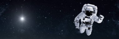 Astronot Noel 'de uzayda dünyanın üzerinde uçar.