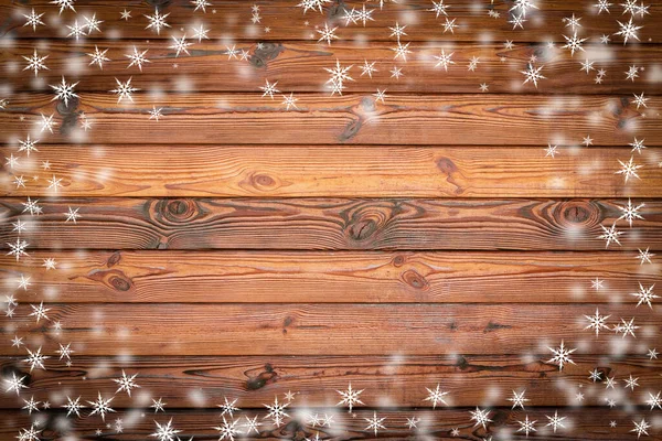 棕色木墙纹理与洁白的雪花和明星 圣诞节背景 — 图库照片