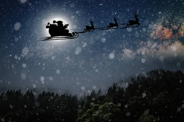Santa Claus Flies Christmas Eve Night Sky Snow — Stock Photo, Image