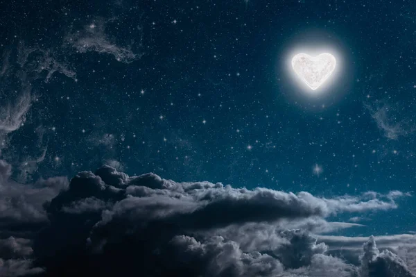 The moon heart-shaped shines over the lovers house on valentines day