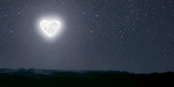 The moon heart-shaped shines over the lovers\' house on valentine\'s day