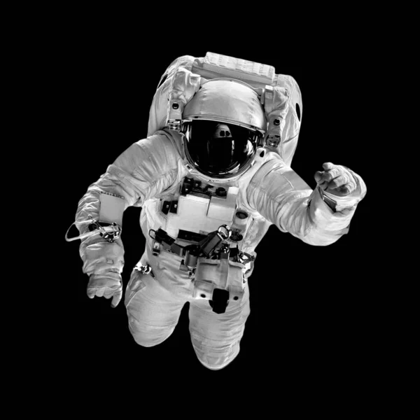 Astronaut Flyger Över Den Svarta Bakgrunden — Stockfoto