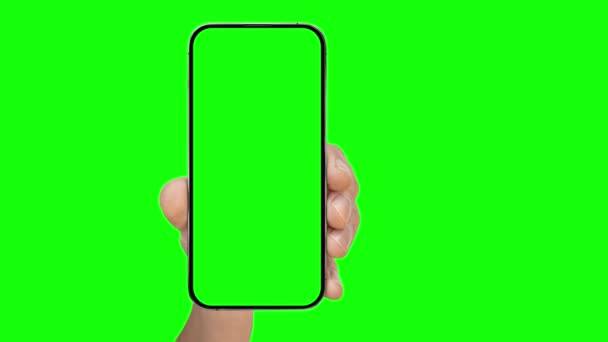 Iphone Telepon Sebuah Iklan Tangan Latar Belakang Hijau — Stok Video