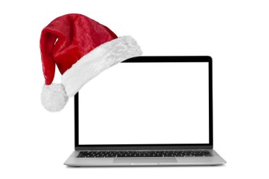 Noel için Noel Baba şapkalı modern dizüstü bilgisayar. 