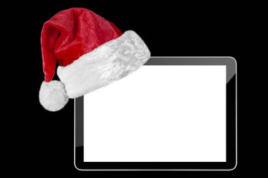 Siyah arka planda Noel Baba şapkasıyla Noel malzemeleri.