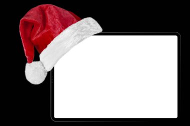 Siyah arka planda Noel Baba şapkasıyla Noel malzemeleri.