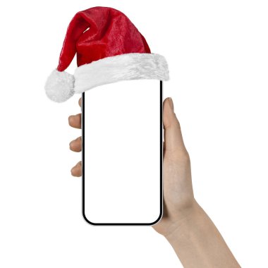 Noel için elinde Noel Baba şapkasıyla bir elinde telefon