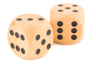 Two wooden dices isolated on white background.