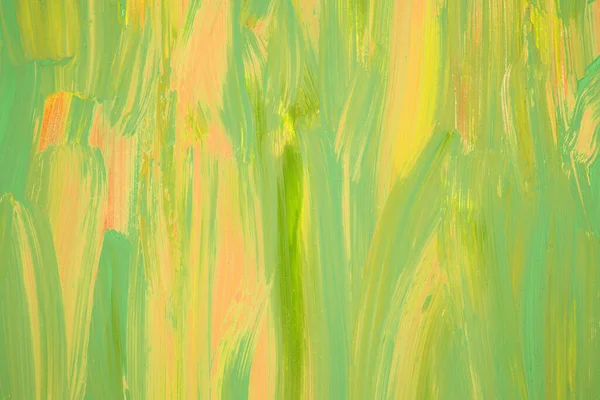 Colorful painting texture as a background. Green and yellow abstract horizontal image. Acrylic painting.