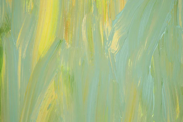 Colorful painting texture as a background. Green and yellow   abstract horizontal image. Acrylic painting.