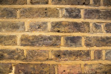 Eski tuğla duvar arka planı, kısmen tarihi bina..