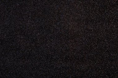 Siyah parlak arkaplan, parlak renkli noktalar..