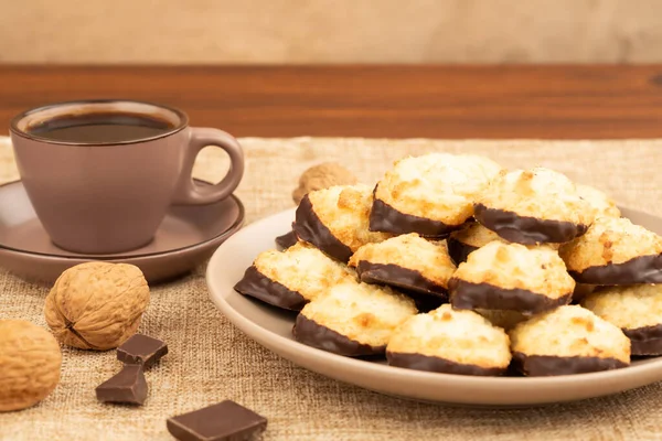 Coconut Cookies Beige Plate Cup Coffee Walnuts Chocolate Burlap Background — Stockfoto