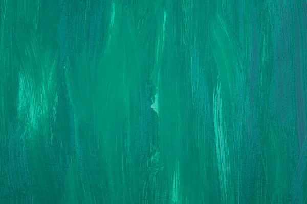 Colorful painting texture as a background. Green abstract horizontal image. Acrylic painting.