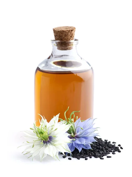 Schwarzkümmelöl Mit Samen Und Nigellablüte Auf Weißem Hintergrund — Stockfoto