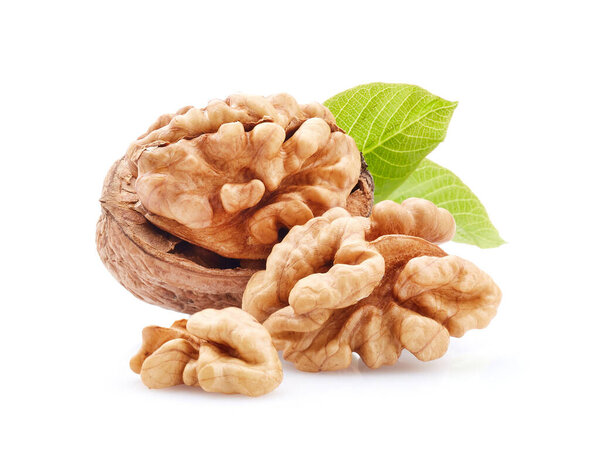 Walnuts in closeup with leaves