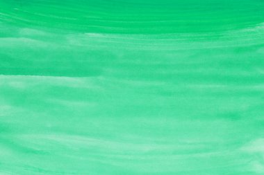 yeşil suluboya arka plan. Fırçayla boyanmış el.