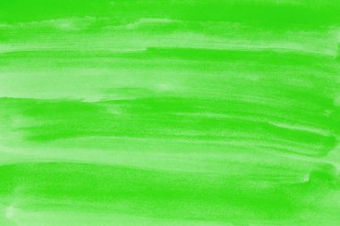 yeşil suluboya arka plan. Fırçayla boyanmış el.