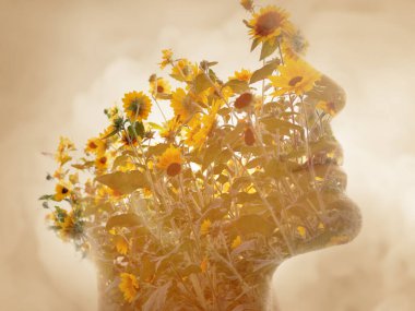A profile portrait of a man disappearing into a photo of sunflowers in double exposure technique on a pale yellow background clipart