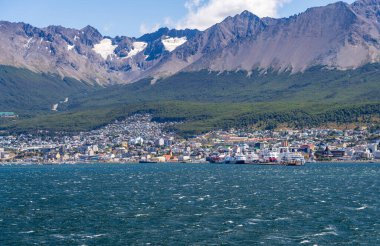 Panorama of the city of Ushuaia in Patagonia Argentina under the mountains showing port