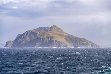 Rocky cliffs form Cape Horn on Hornos Island in Chile