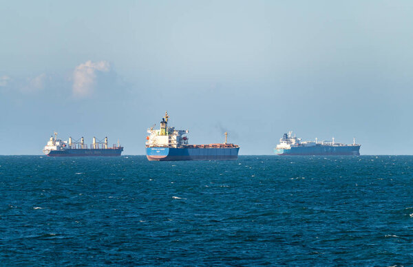 Bahia Blanca, Argentina - 3 February 2023: Three large cargo and LPG ships at anchor
