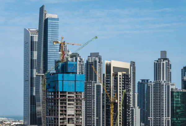 Cranes Surround Construction New Tower Apartments Canal Business Bay Dubai — Stock Photo, Image