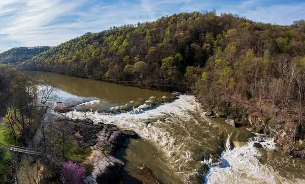 stock image Aerial view of Valley Falls State Park near Fairmont in West Virginia on a spring day with redbud blossoms on the trees