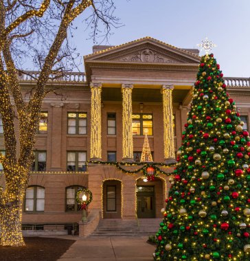 Christmas lights surround the Williamson County Courthouse in downtown Georgetown in Texas clipart