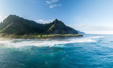 Aerial view of Maniniholo Bay and Kee beach towards the Na Pali coastline of Kauai clipart