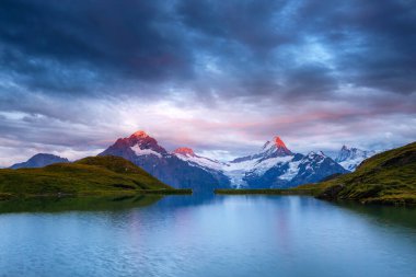 Great view of the snow rocky massif. Popular tourist attraction. Dramatic and picturesque scene. Location place Bachalpsee in Swiss alps, Grindelwald valley, Bernese Oberland, Europe. Beauty world.