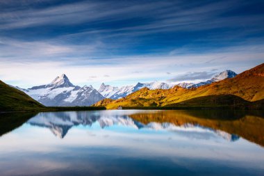 Great view of the snow rocky massif. Popular tourist attraction. Dramatic and picturesque scene. Location place Bachalpsee in Swiss alps, Grindelwald valley, Bernese Oberland, Europe. Beauty world.