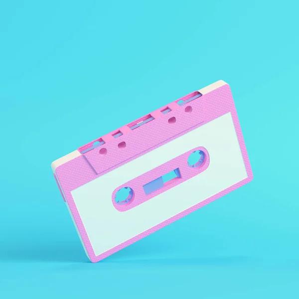 パステルカラーの明るい青の背景にピンクのヴィンテージオーディオテープ 最小限の概念 3Dレンダリング — ストック写真