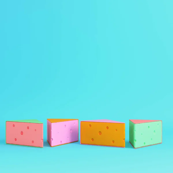四个色彩艳丽的奶酪部分 背景为浅蓝色 色彩艳丽 最低纲领的概念 3D渲染 — 图库照片