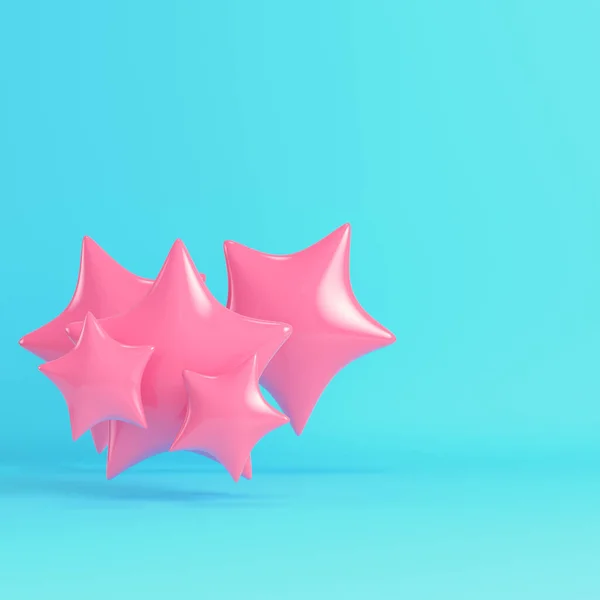 Πετώντας Ροζ Αστέρια Φωτεινό Μπλε Φόντο Παστέλ Χρώματα Μινιμαλιστική Έννοια — Φωτογραφία Αρχείου