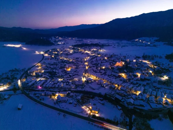 Aerial View Snowy Mountain Town Nighttime Imagens Royalty-Free