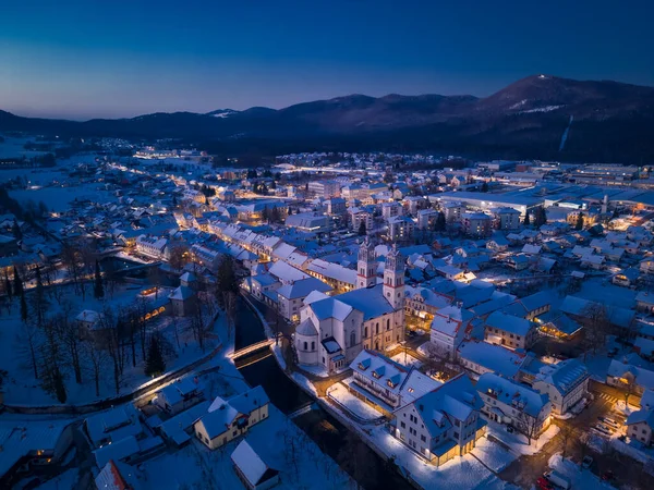 Aerial View Snowy Mountain Town Nighttime Stockfoto