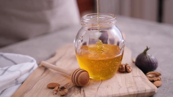 Honey Slowly Pouring Glass Jar Domestic Kitchen — Stock Video